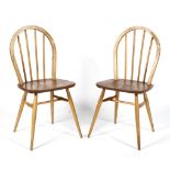 A pair of Ercol hooped spindle back chairs,