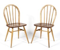 A pair of Ercol hooped spindle back chairs,