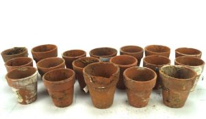 Eighteen various small vintage terracotta plant pots,