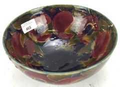A Moorcroft pottery circular fruit bowl in the Pomegranate pattern,
