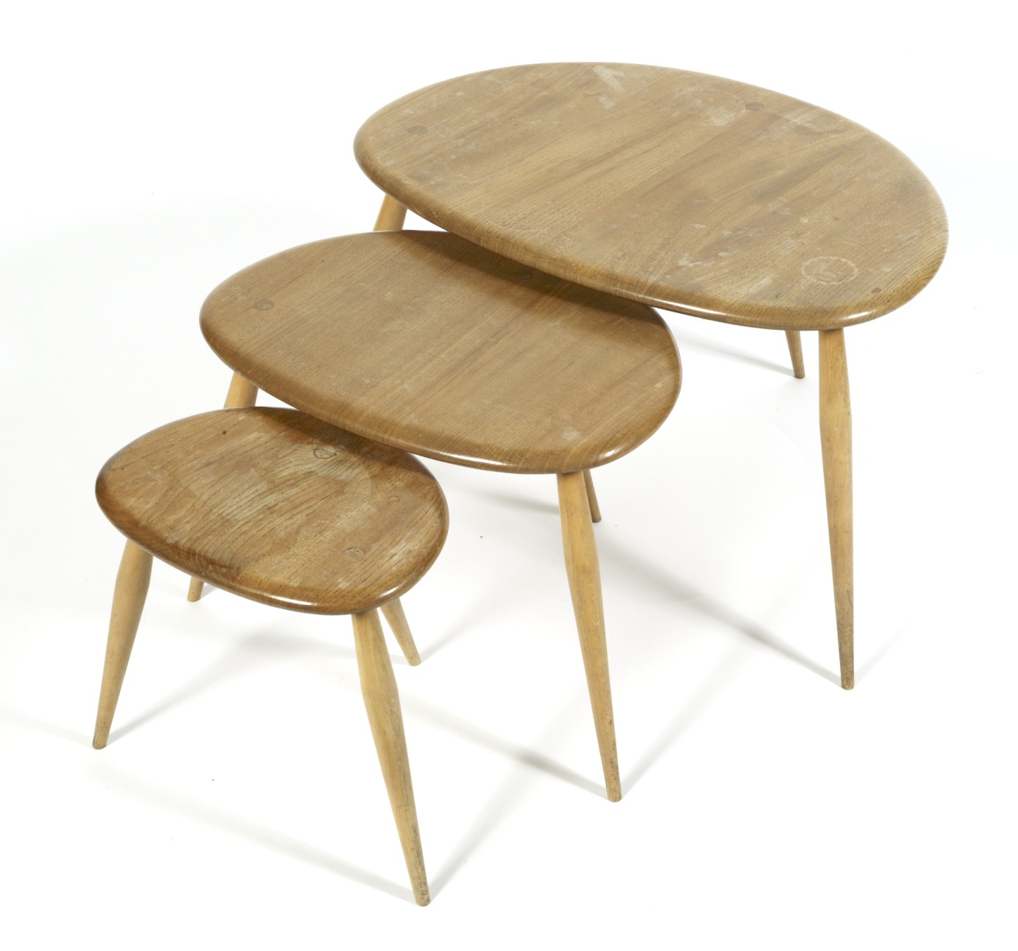 An Ercol blonde elm pebble nest of three tables, - Image 2 of 2