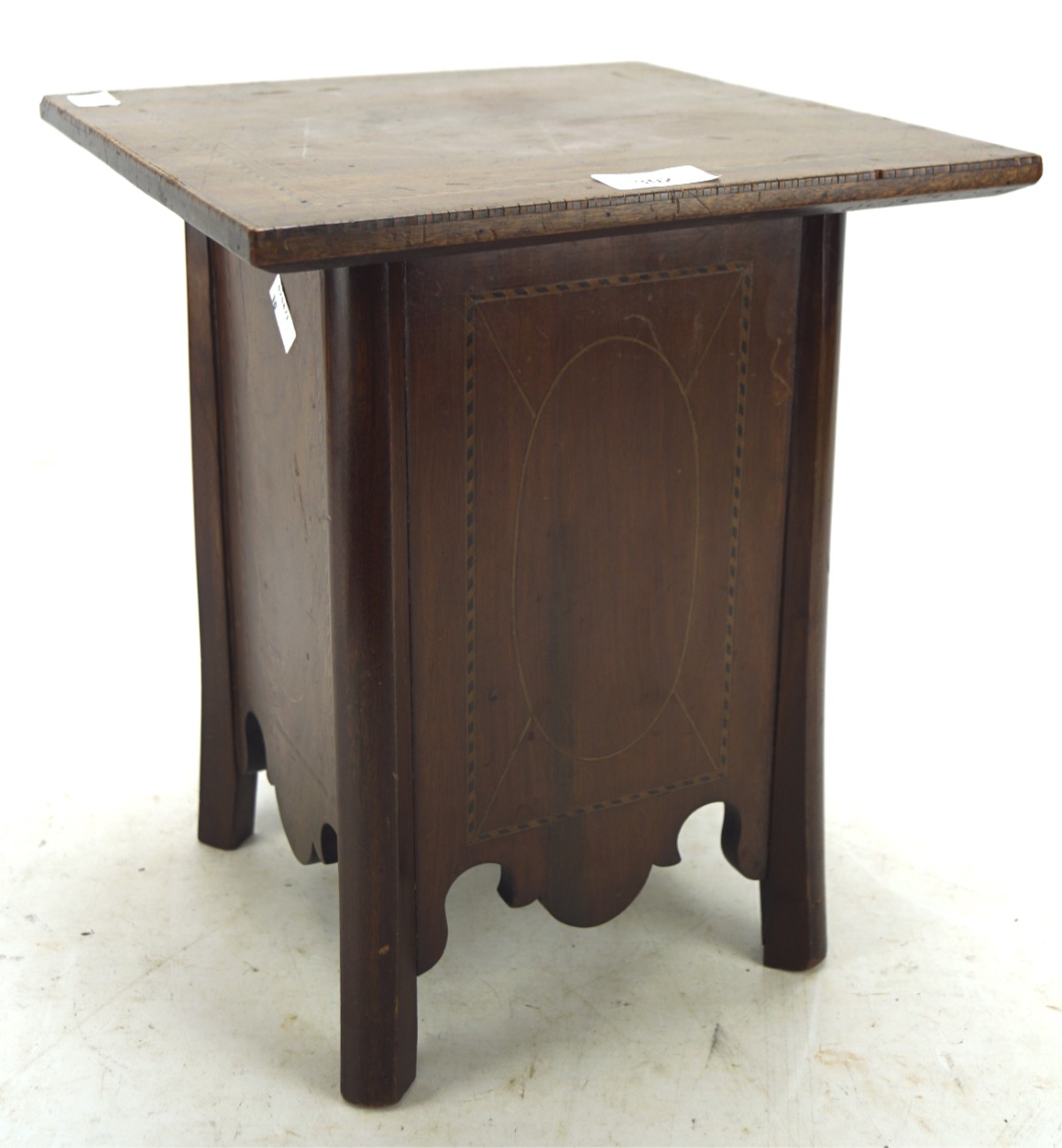 A mahogany jardiniere stand, circa 1900, of square section,