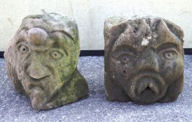 Two stone grotesque masks, one being a corner piece,