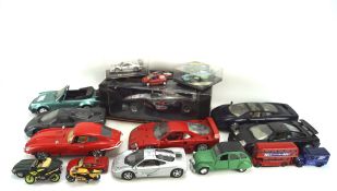 A collection of model cars, including: a boxed Mclaren F1 car, a Tonka Porsche 900 Turbo,