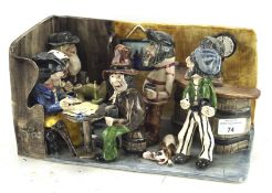 An Alan Young (West Country, Devon) studio pottery large model of pirates in a pub,