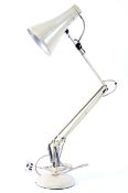 A Herbert Terry original anglepoise table lamp in cream