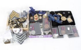 A collection of assorted masonic and military medals, buttons and badges, including RAF,