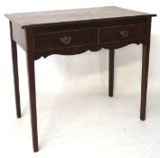 A 19th century string inlaid mahogany side table, fitted with two short drawers with brass handles,
