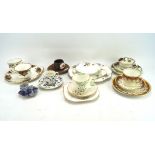 An assortment of trios and cups and saucers, including an Art Deco example,