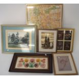 A group of pictures including a map of Warsaw, a paper cut picture of flowers, and more,