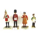 Four ceramic figures of soldiers and guards, comprising three Royal Doulton, Iconic London series,