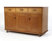 A Priory elm sideboard,