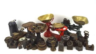 A collection of kitchen scales, including red,
