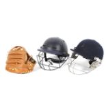 Two cricket helmets and a baseball glove, one of the helmets being by Masuri,