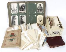A large collection of vintage postcards, letters,