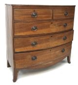 An early 19th century mahogany bow fronted chest of drawers, with two short over three long drawers,