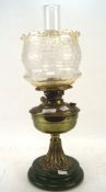 A Victorian oil lamp,