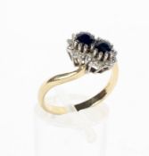 An 18ct gold diamond and two stone sapphire dress ring,