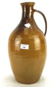 A large Studio Pottery treacle glazed flagon,incised to the base PR CH C/S,