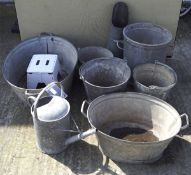 A selection of galvanized metal wares, including buckets, flower tubbs,