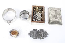 An assortment of mixed costume jewellery and collectables, including silver hinged bangle,