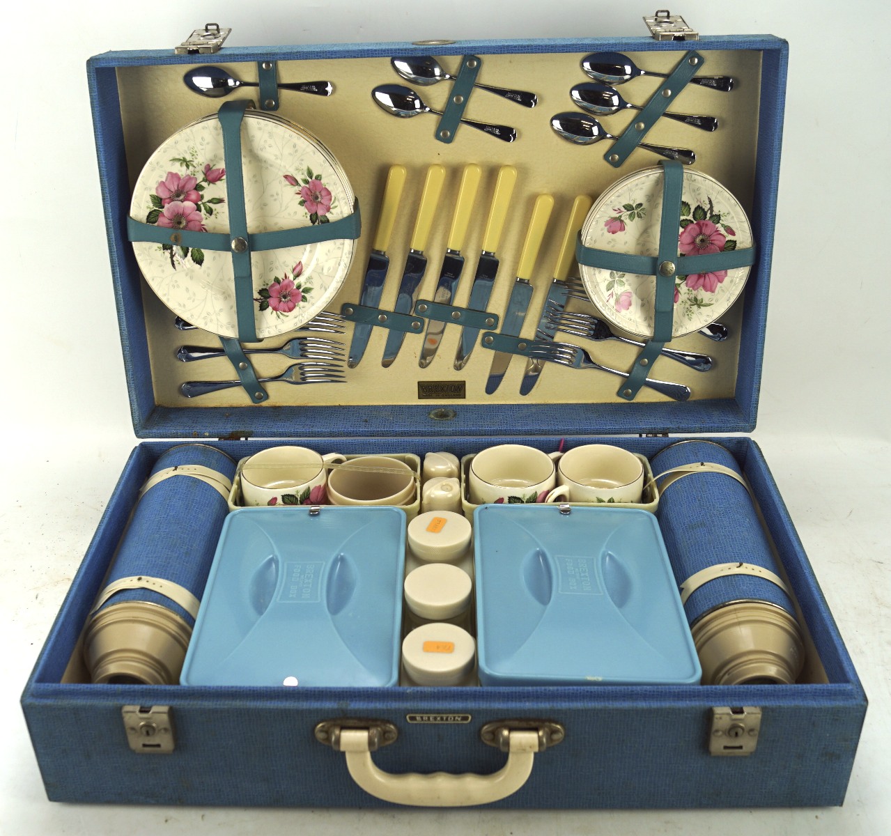 A Brexton cased picnic set, with a plastic handle and fitted interior,