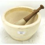 A large stoneware pestle and mortar and a large stoneware saltglazed storage jar with lid,