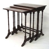 An Early 20th century mahogany nest of three occasional tables,