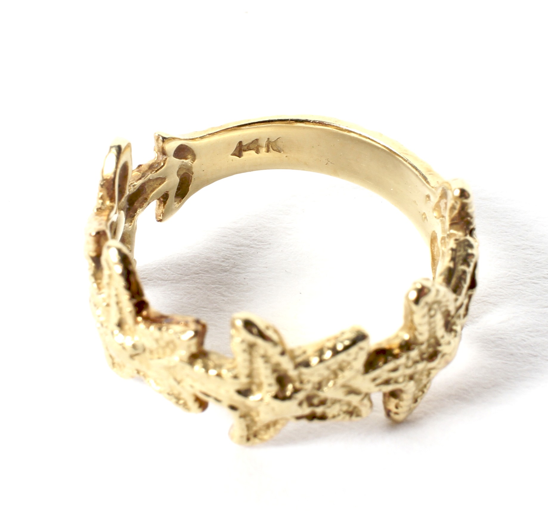 A yellow metal ring, marked '14k', modelled as five star fish, weight 3. - Image 2 of 2