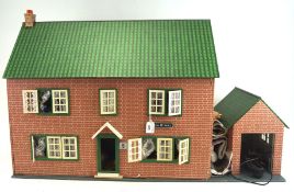A vintage doll's house, mid century,