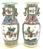 A pair of Cantonese porcelain vases, painted with figures before terracing, early 20th century,