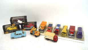 A collection of diecast, comprising cars and commercial vehicles, including Maisto, Dinky,