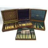 Three canteens of cutlery, one an engraved Mappin & Webb example in oak case,