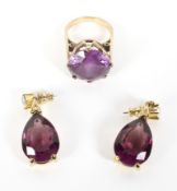 A yellow mental amethyst dress ring of large proportion,