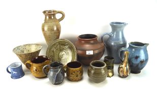 A collection of 20th century Studio pottery of various sizes and designs,