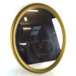 A vintage 1970s gilt framed wall mirror, of oval form,