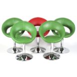 A set of five contemporary faux leather retro style revolving stools raised on a chrome column and