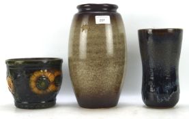 Three ceramic vases, one West German model number 887-14 13cm high,