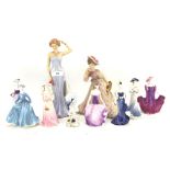 A collection of ceramic figures of ladies,