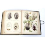A Victorian leather bound and initialled photo album,