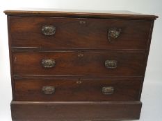 A 19th century mahogany secretaire, the drop front opening to reveal fitted interior,