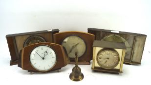 A selection of vintage clocks, four by Metamec and a Smiths 8 day example,