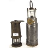 Two lanterns, one a miner's lamp marked for Hookley Lamp & Limelight Co., Colliery no.