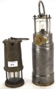 Two lanterns, one a miner's lamp marked for Hookley Lamp & Limelight Co., Colliery no.