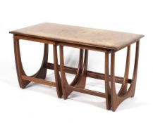 A G-Plan teak nest of three tables comprising a coffee table and two side tables,