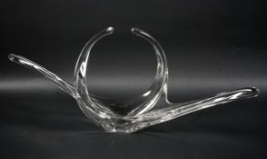 A mid 20th century clear glass dish with elongated branches and arches,