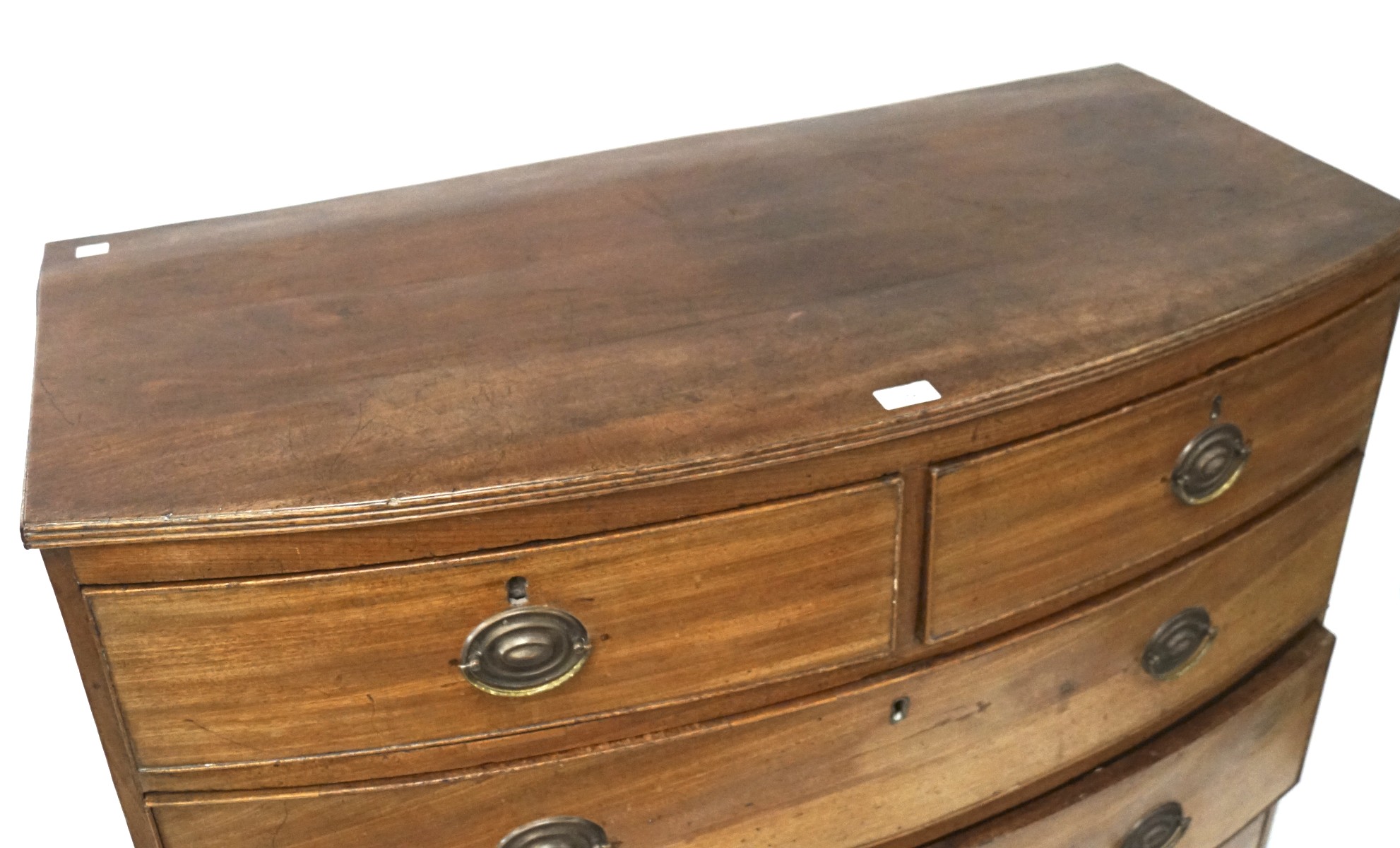 An early 19th century mahogany bow fronted chest of drawers, with two short over three long drawers, - Image 2 of 3
