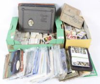 A collection of cigarette cards and albums, including Wills Cigarette cards,