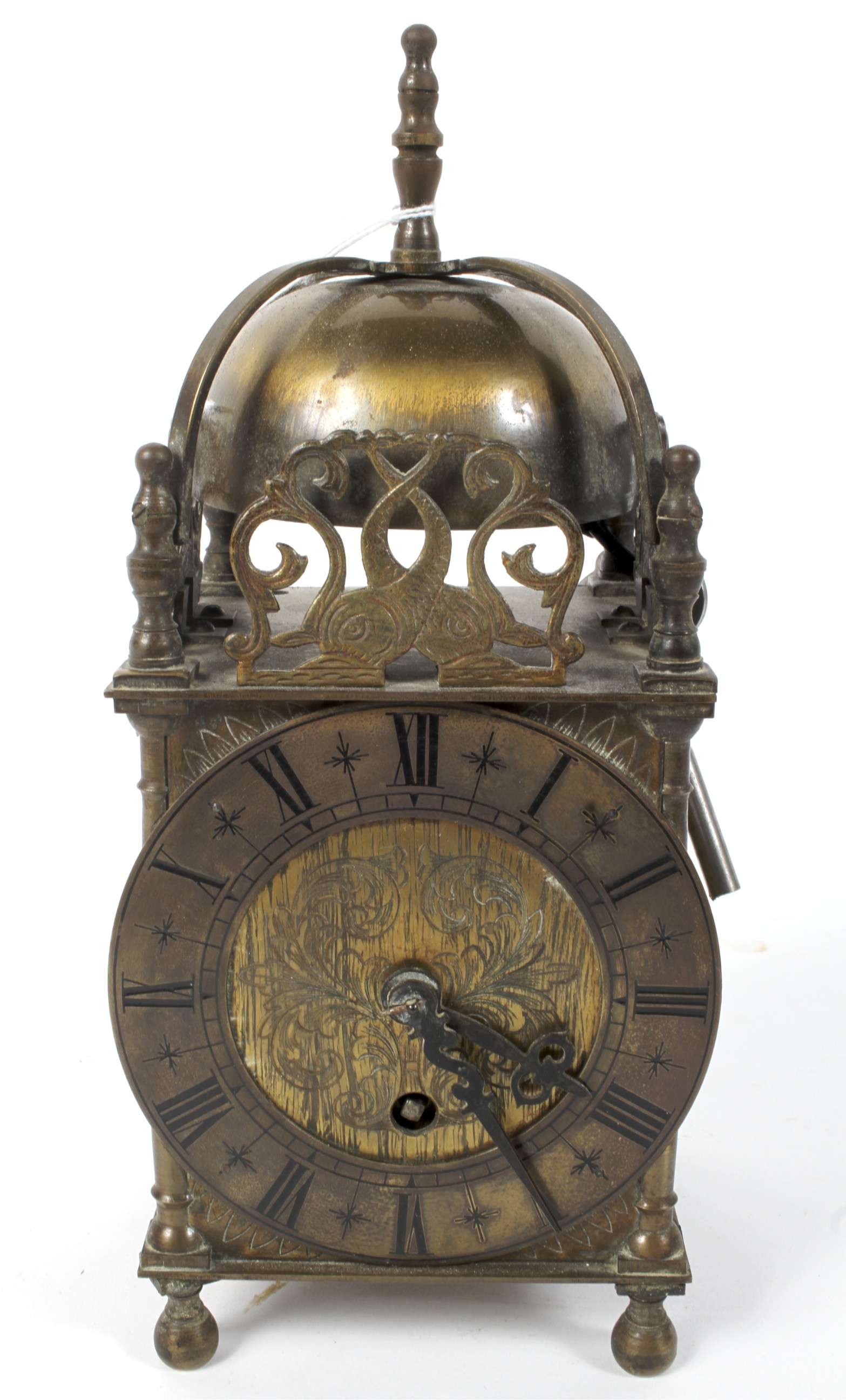 A brass lantern clock, early 20th century, the mechanism marked Empire, with key, 23.