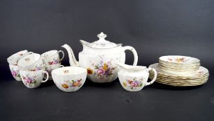 A Royal Crown Derby part tea service, in the 'Deeby Posies' pattern, comprising a teapot, cream jug,